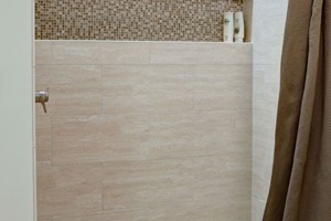 SHOWER - ELEGANZA CLASSIC TRAVERTINE POLISHED, 2X2 IVORY HONED AND FILLED, AND BLISS SPA SQUARES